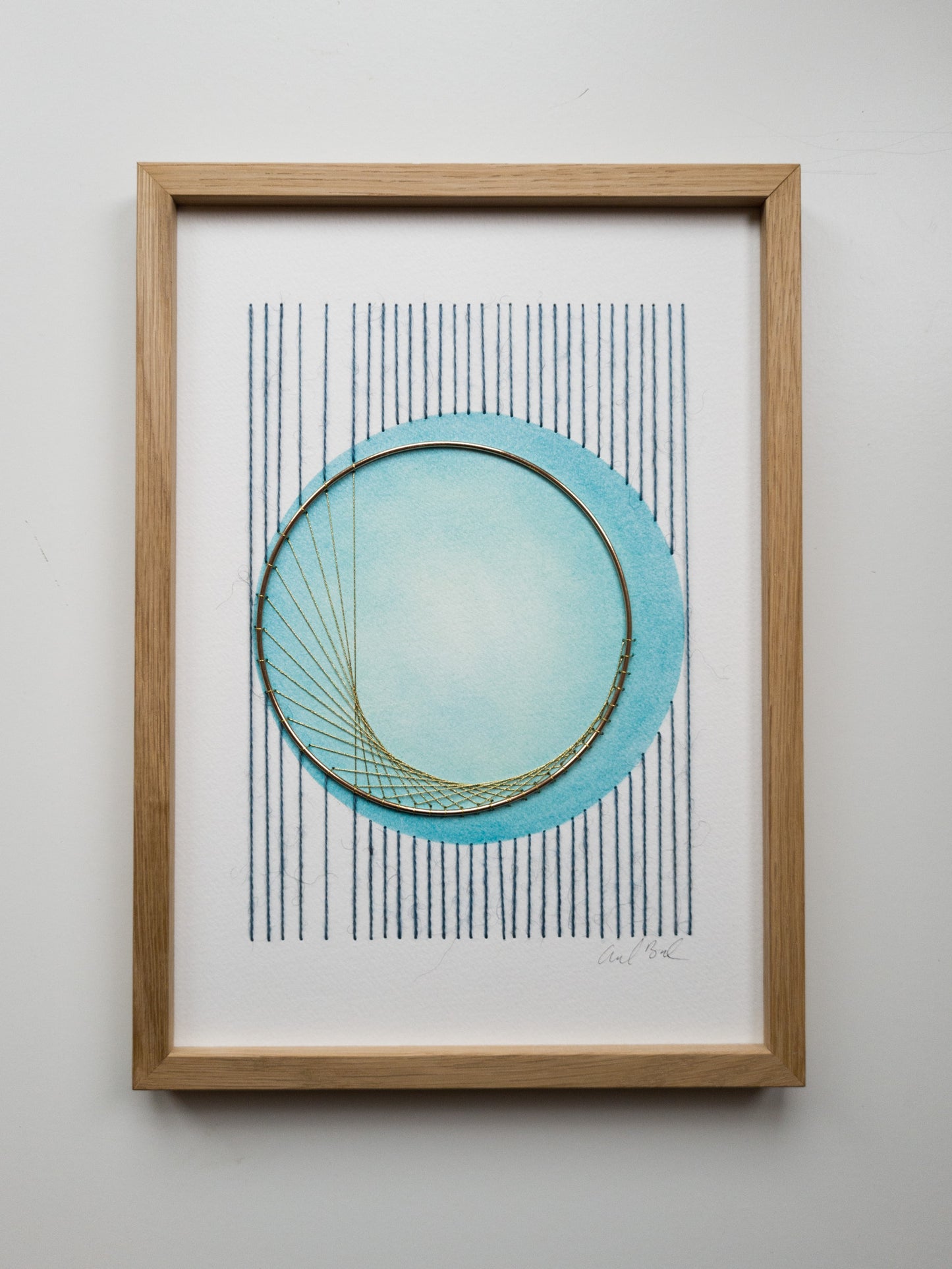 paper Embroidery - blue with brass ring - cirkel - front